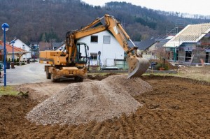Europe, Germany, Rhineland Palatinate, Preparing ground for house foundation